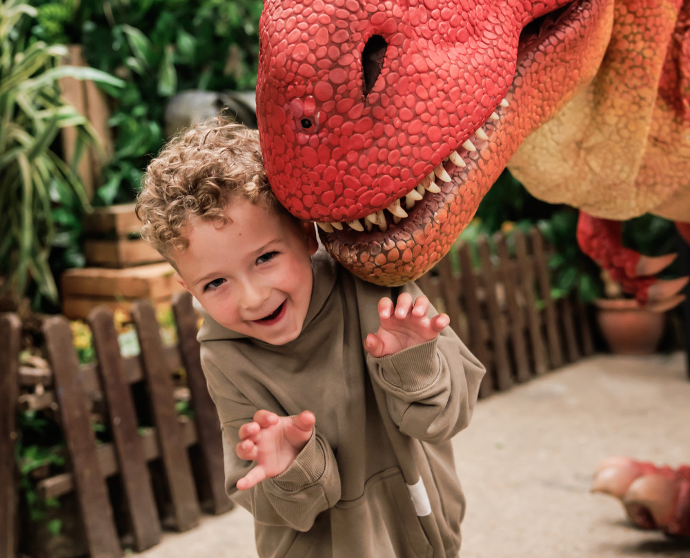 Child with a dinosaur