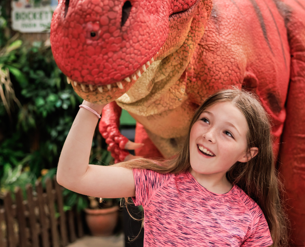 Child with a dinosaur