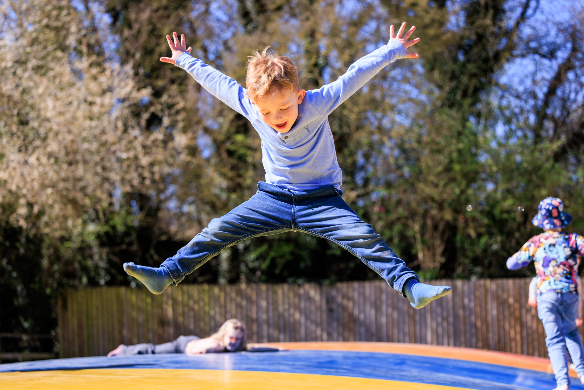 Child enjoying the big jumping pillows