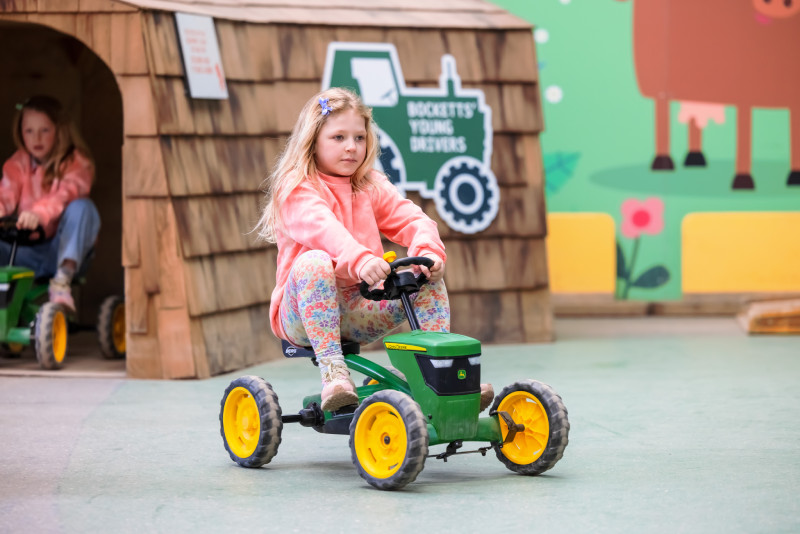 Young girl enjoying the tractor rides