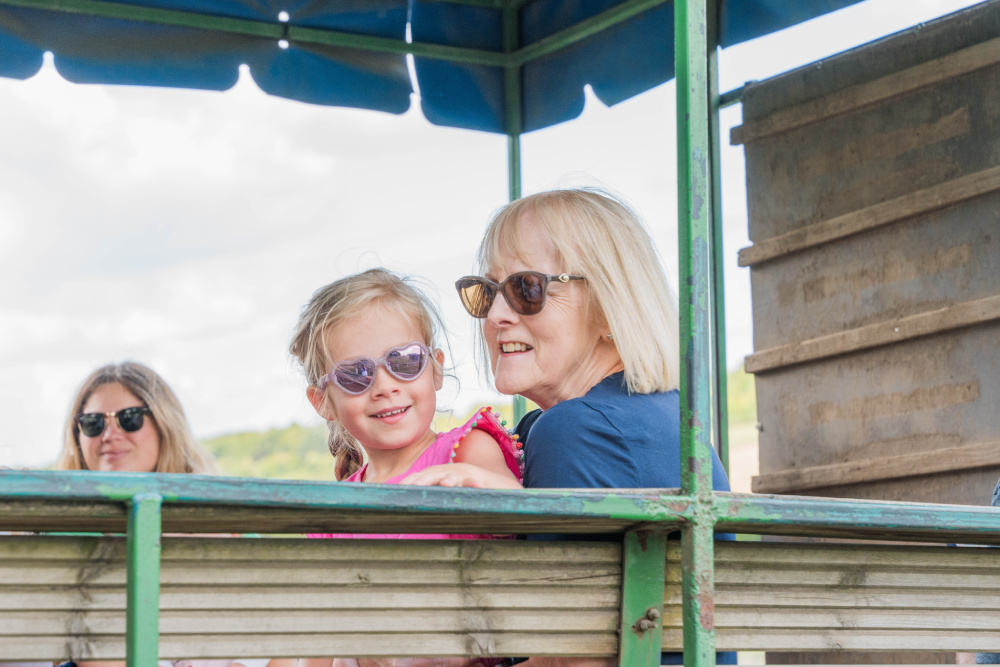 People enjoying their tractor ride